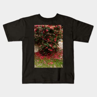 Red camellia flowers blooming in the garden Kids T-Shirt